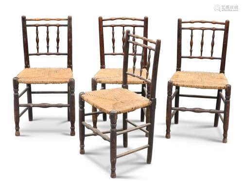 A SET OF FOUR RUSH-SEATED OAK DINING CHAIRS, EARLY 19TH CENT...