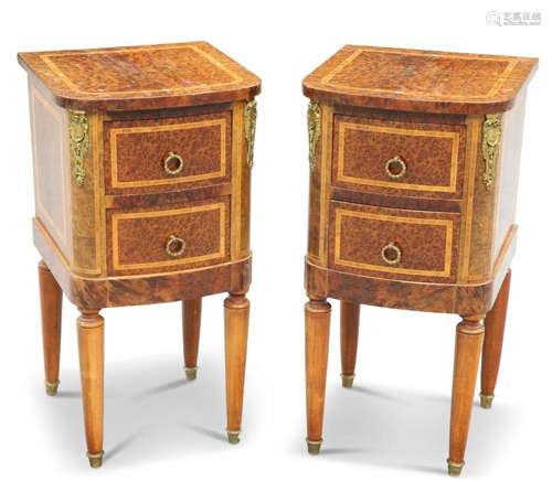 A PAIR OF BURR WOOD BEDSIDE CABINETS, bow-fronted, each with...