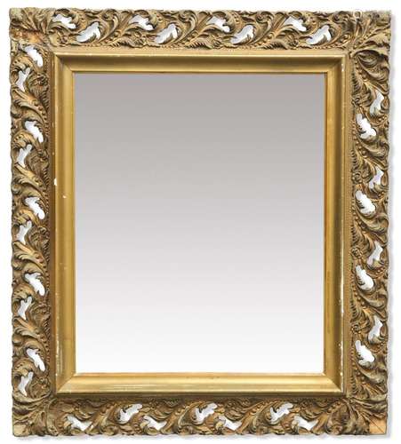 A VICTORIAN GILT-COMPOSITION MIRROR, the rectangular mirror ...