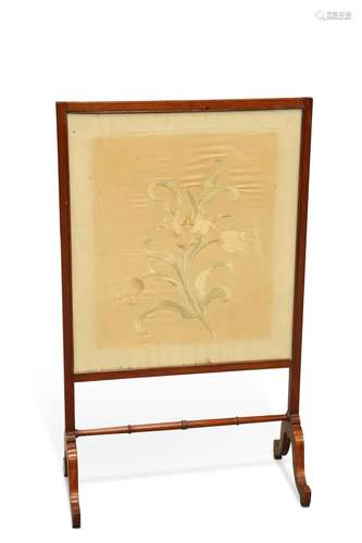 AN EDWARDIAN MAHOGANY AND NEEDLEWORK FIRESCREEN, the rectang...