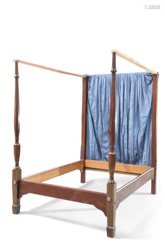 A REGENCY-STYLE MAHOGANY FOUR-POSTER BED, with reeded and le...