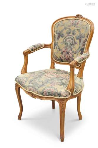 A LOUIS XV-STYLE BEECH AND UPHOLSTERED FAUTEUIL, the moulded...