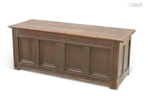 A LATE 17TH CENTURY OAK COFFER, with carved rails and four-p...