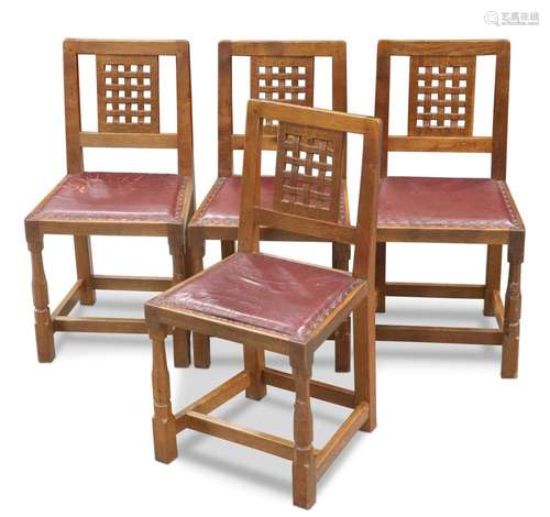 WILF HUTCHINSON, A SET OF FOUR SQUIRRELMAN OAK DINING CHAIRS...