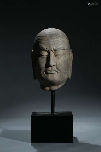 A LIMESTONE CARVED HEAD OF LUOHAN