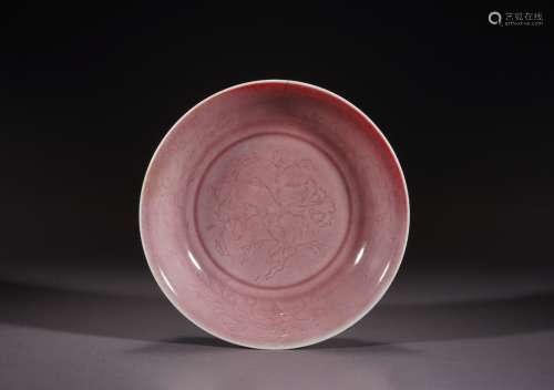 A CHINESE PEACHBLOOM RED GLAZED SAUCER DISH