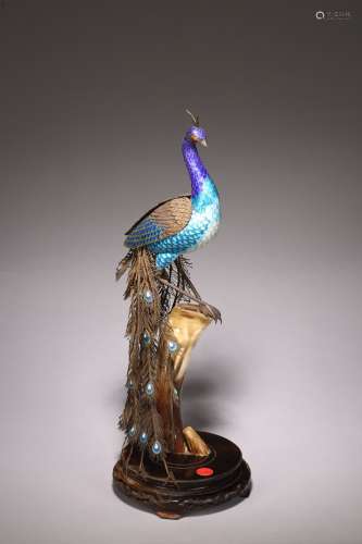 A CHINESE SILVER ENAMEL PEACOCK
