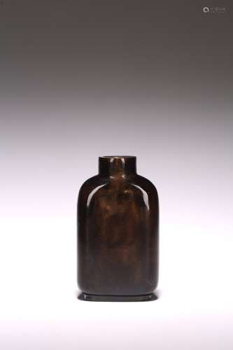 A CHINESE SMOKY CRYSTAL CARVED SNUFF BOTTLE