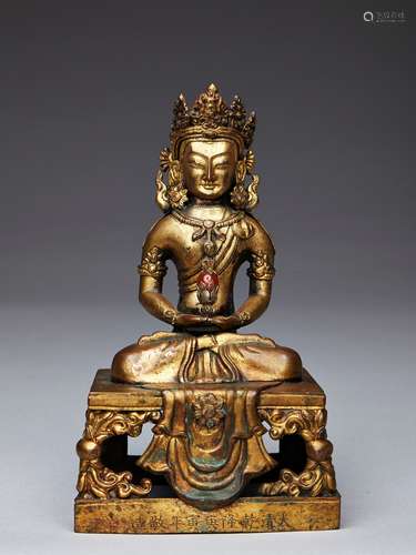 A GILT-BRONZE FIGURE OF AMITAYUS