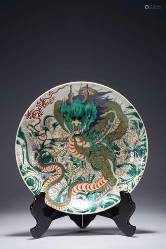 A CHINESE FAMILLE VERTE DRAGON DISH