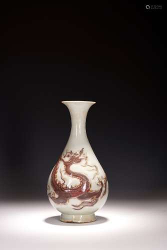 A WHITE AND RED GLAZED DRAGON VASE