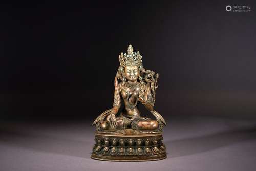 A SILVER FIGURE OF WHITE TARA