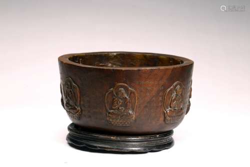 A CHINESE AGARWOOD CARVED 'BUDDHIST' BOWL