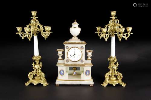 A SET OF VIENNA WHITE MARBLE AND GILT CLOCK SET