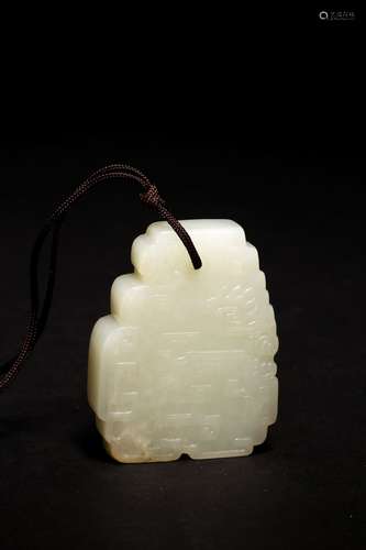 A CHINESE WHITE JADE 'PHOENIX' PENDANT