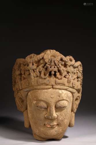 A LARGE STONE CARVED BUDDHA HEAD