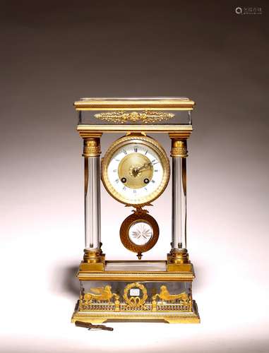 A FRENCH ORMOLU BRONZE AND CRYSTAL MANTEL CLOCK