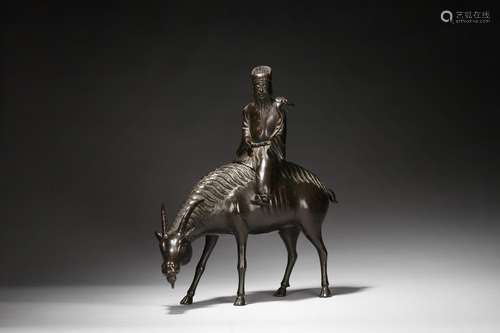 A BRONZE 'IMMORTAL ON RAM' INCENSE BURNER