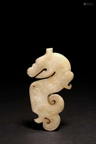 A CHINESE WHITE JADE DRAGON PLAQUE