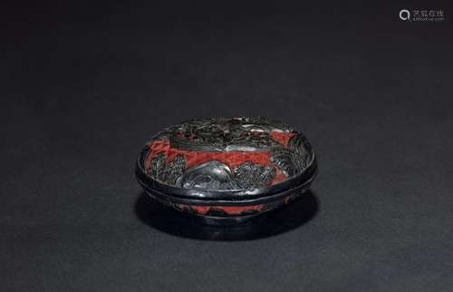 A BLACK AND CINNABAR LACQUER FIGURES PASTE BOX