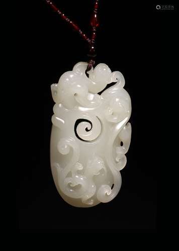 A CHINESE WHITE JADE 'CHILONG' PENDANT