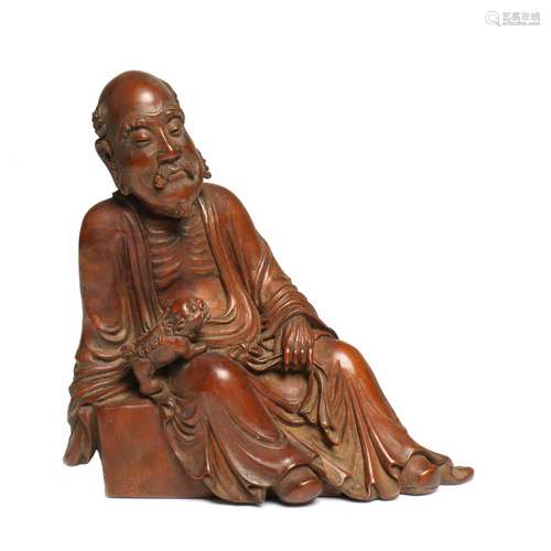 A Chinese Carved Huang Yang Wood Figure