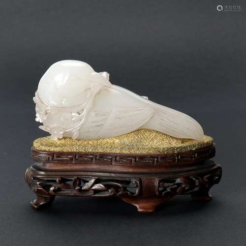 A Chinese White Jade Carved Bird With Wood Stand