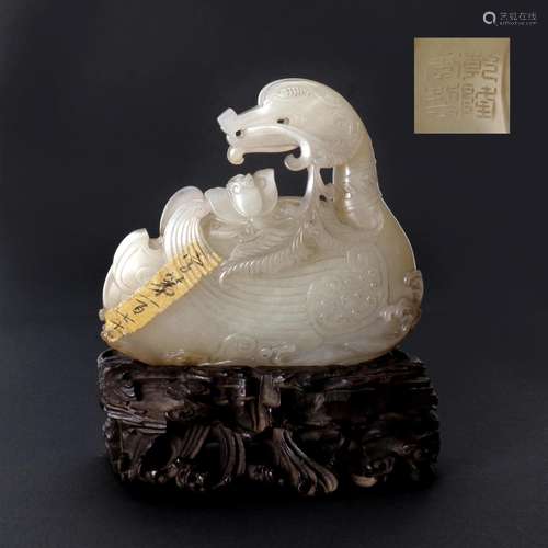 A Chinese Carved White Jade Bird With Zitan Hardwood Stand