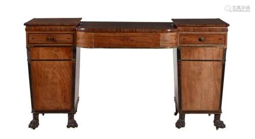 A Regency mahogany and ebonised pedestal sideboard
