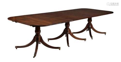 A mahogany three-pillar dinning table in George III style