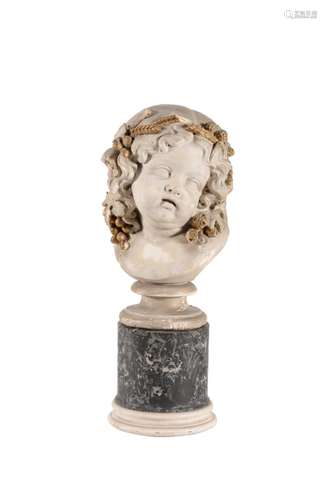 An Italian plaster bust of a cherub