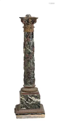 A Verde Antico and gilt metal mounted column