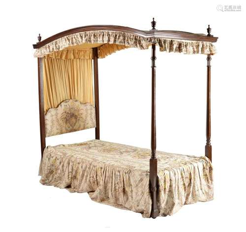 An Edwardian mahogany four poster bed in George III style