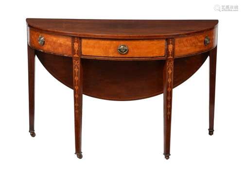 A George III mahogany, satinwood, and inlaid tea table