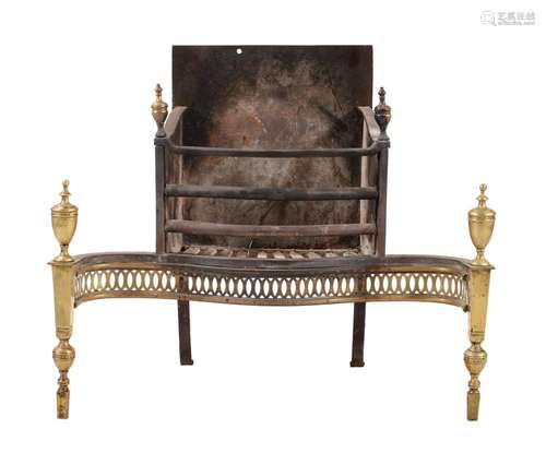 A George III brass and cast iron fire grate in neo-classical...