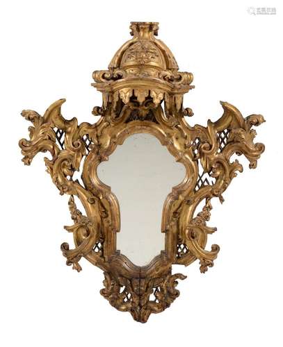 An Italian baroque cartouche shaped wall mirror