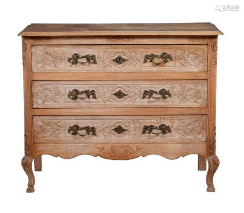 A French oak commode in Louis XVI style