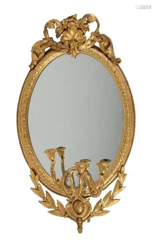 A pair of Victorian giltwood and composition girandole oval ...