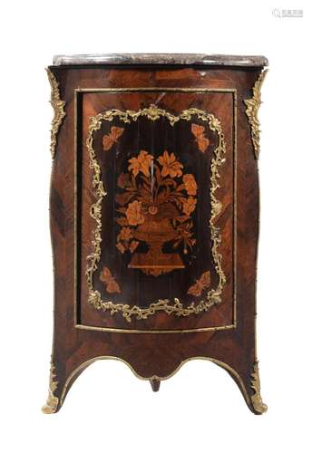 A marquetry and ormolu mounted corner cupboard