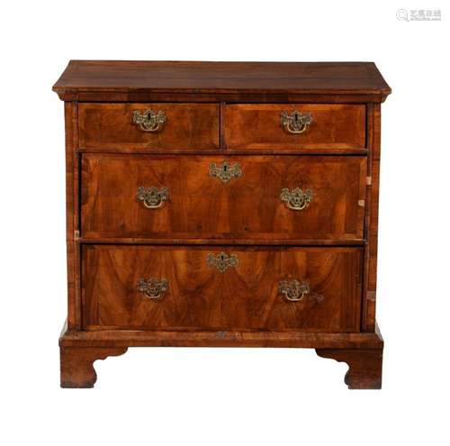 A George II walnut chest of drawers