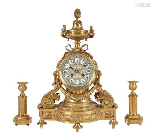 A French gilt brass mantel clock in Louis XV style