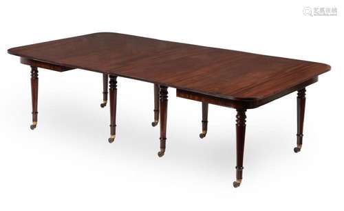 A mahogany dining table in George III style