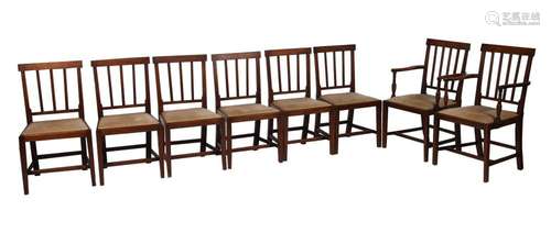 A set of eight George III mahogany dining chairs