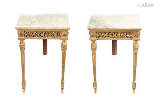 A pair of giltwood and marble topped console tables