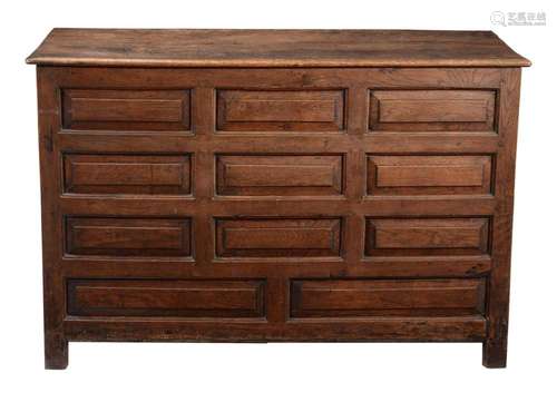 A George III panelled oak chest