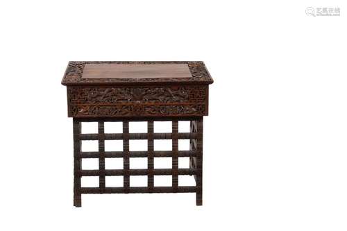 A Chinese carved hardwood rectangular table