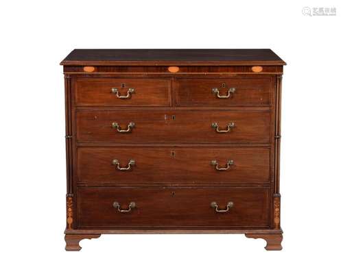 A mahogany and inlaid chest of drawers