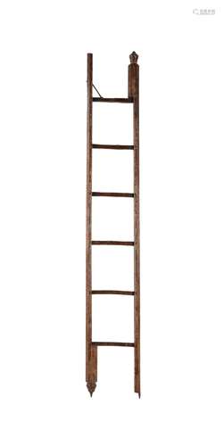 An Edwardian stripped oak pole ladder