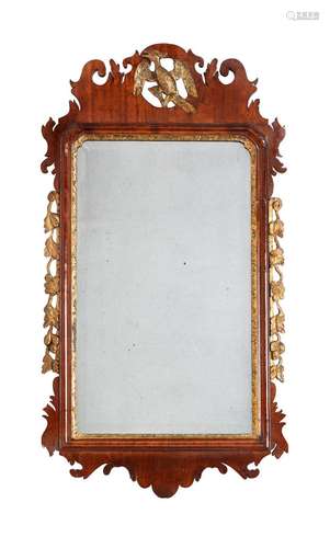 A George III walnut and parcel gilt mirror