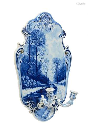 A Dutch Delft (De porcelyn fles) wall blue and white girondo...